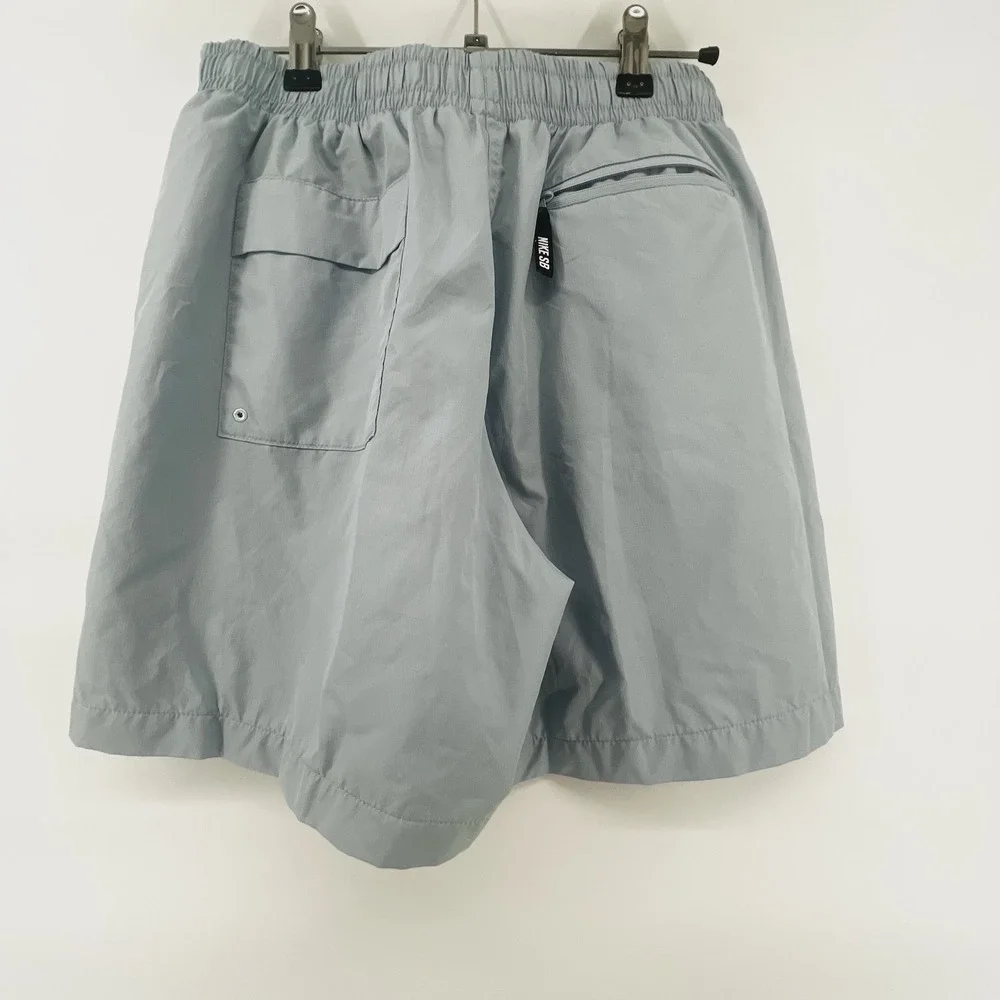 Nike SB Men's M Light Blue Skateboard Shorts Elastic Waist Mesh Lined Streetwear